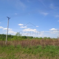 земля в Елькино с газом